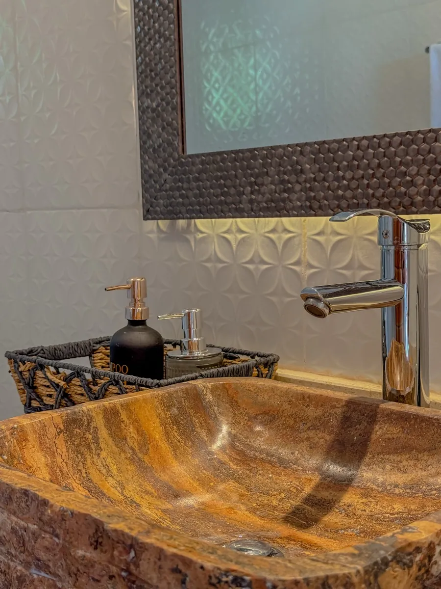 La Tienda de Raya — Bathroom with stone sink